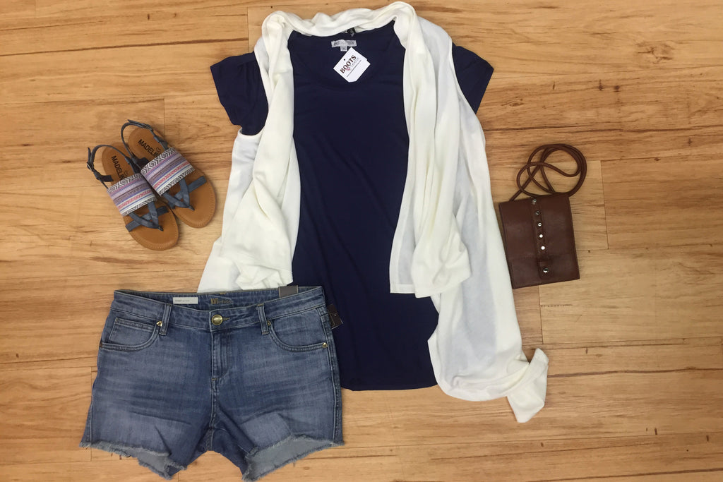 Outfits we are LOVING! Vest paired with shorts